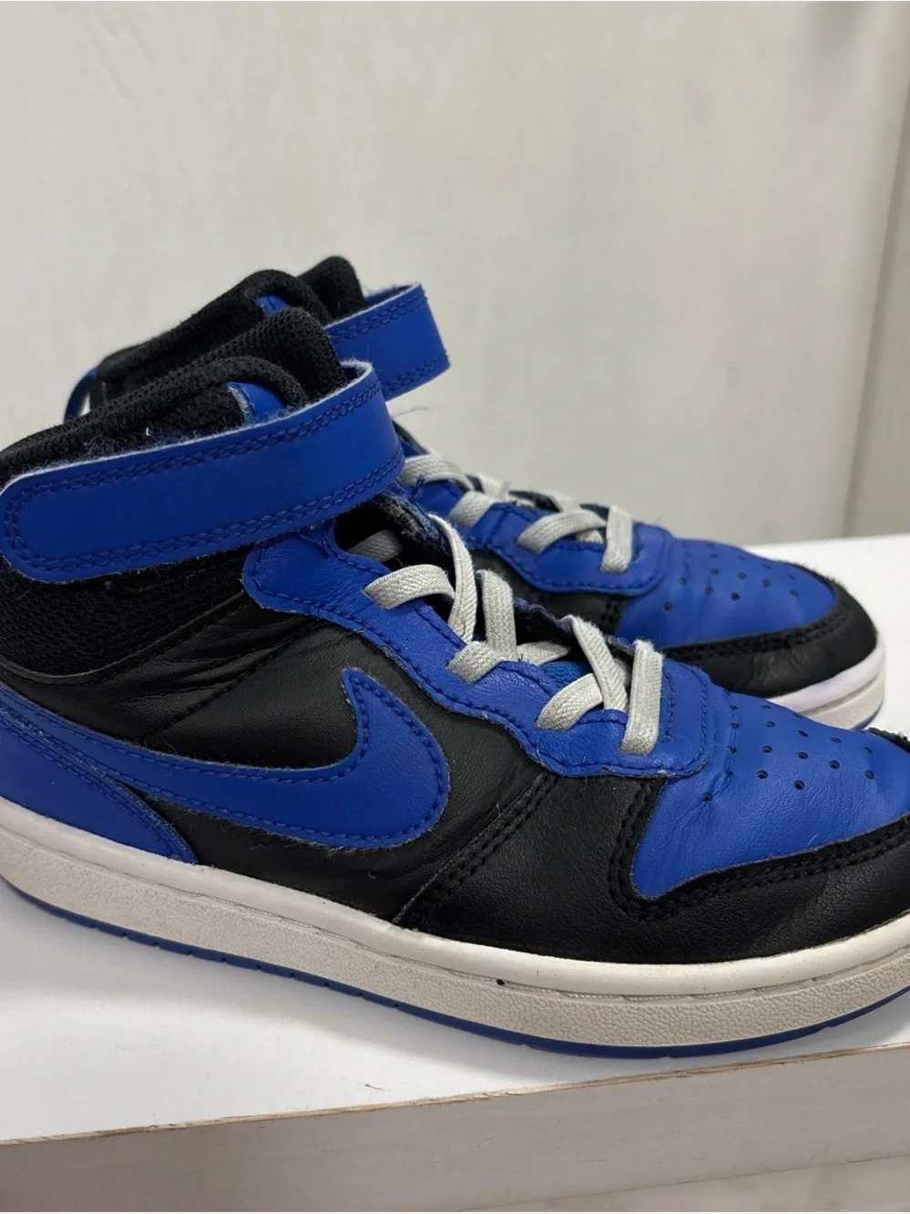 Nike Kids Mid-Top Sneakers in Black and Royal Blue
